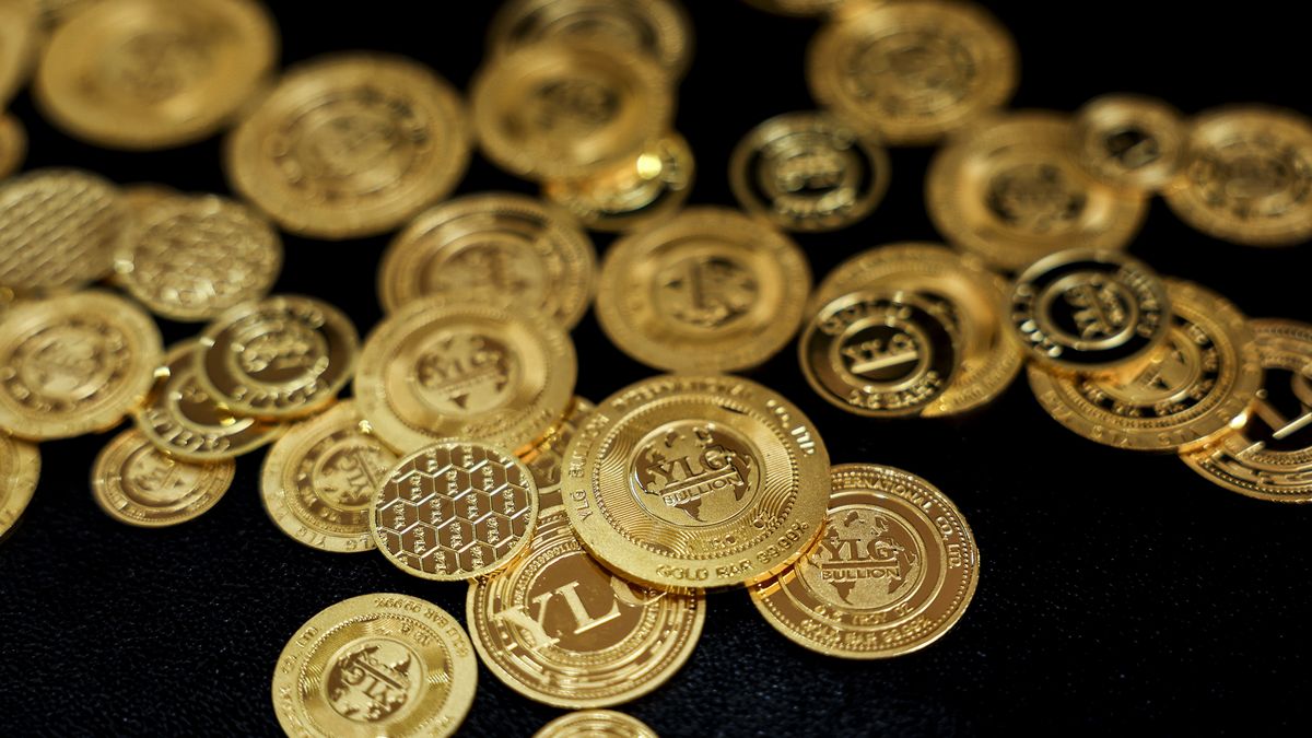 Gold coins at the YLG Bullion International Co. headquarters in Bangkok, Thailand, on Friday, Dec. 22, 2023. Gold headed for a weekly gain after US price data came in cooler than forecast, reinforcing expectations for multiple interest rate cuts by the Federal Reserve next year. Photographer: Chalinee Thirasupa/Bloomberg via Getty Images
