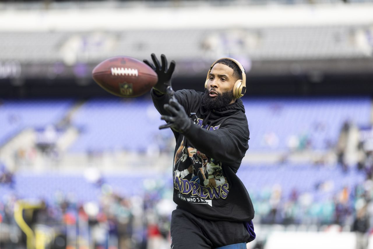 BALTIMORE, MARYLAND - DECEMBER 31: Odell Beckham Jr. #3 of the Baltimore Ravens completes a pass as he warms up prior to an NFL football game between the Baltimore Ravens and the Miami Dolphins at M&T Bank Stadium on December 31, 2023 in Baltimore, Maryland. (Photo by Michael Owens/Getty Images)