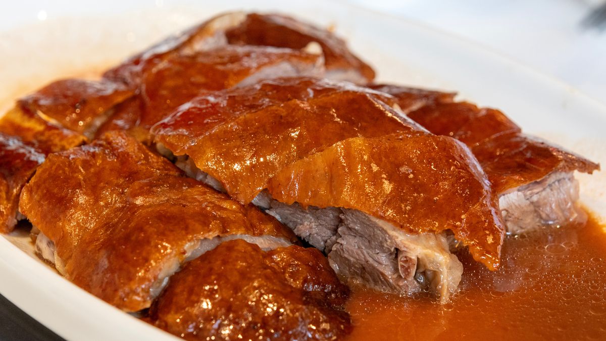 Roasted golden goose is cut into pieces and placed on a plate
chinese, goose, roast, food, hongkong, table, restaurant, meat, dinner, meal, cuisine, gourmet, lunch, dish, wooden, baked, roasted, fried, poultry, duck, brown, closeup, cooked, delicious, style, tasty, guangzhou, chinese, goose, roast, food, hongkong, table, restaurant, meat, dinner, meal, cuisine, gourmet, lunch, dish, wooden, baked, roasted, fried, poultry, duck, brown, closeup, cooked, delicious, style, tasty, guangzhou