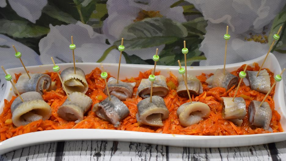 Śledź na greckiej pierzynce