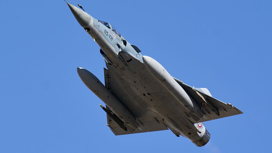 ALBACETE, CASTILLA-LA MANCHA, SPAIN - FEBRUARY 22: A French Mirage 2000 aircraft performs combat air maneuvers in the vicinity of the Los Llanos air base on February 22, 2022, in Albacete, Castilla-La Mancha, Spain. The maneuvers are conducted during one of the NATO Tactical Leadership Program (TLP) courses, better known as NATO Pilot School. Currently, the TLP organization is made up of ten NATO countries: Belgium, Denmark, France, Germany, Greece, Holland, England, Italy, Spain and the United States, although other nations also participate by contracting their assistance. The pilots take advantage of these practices to prepare themselves for a possible war in Ukraine. (Photo By A. Perez Meca/Europa Press via Getty Images)