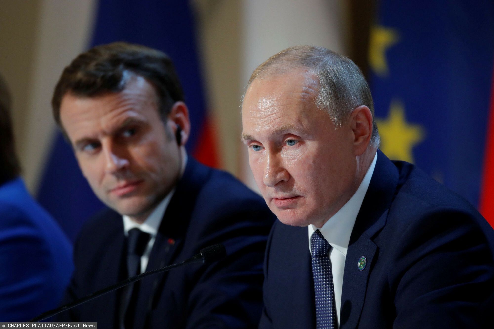 arch37
French President Emmanuel Macron (L) and Russian President Vladimir Putin (R) give a press conference after a summit on Ukraine at the Elysee Palace, in Paris, on December 9, 2019. - Leaders aim for new withdrawal of forces from Ukraine conflict zones by March 2020, according to a communique on December 9, 2019. (Photo by CHARLES PLATIAU / POOL / AFP)
CHARLES PLATIAU