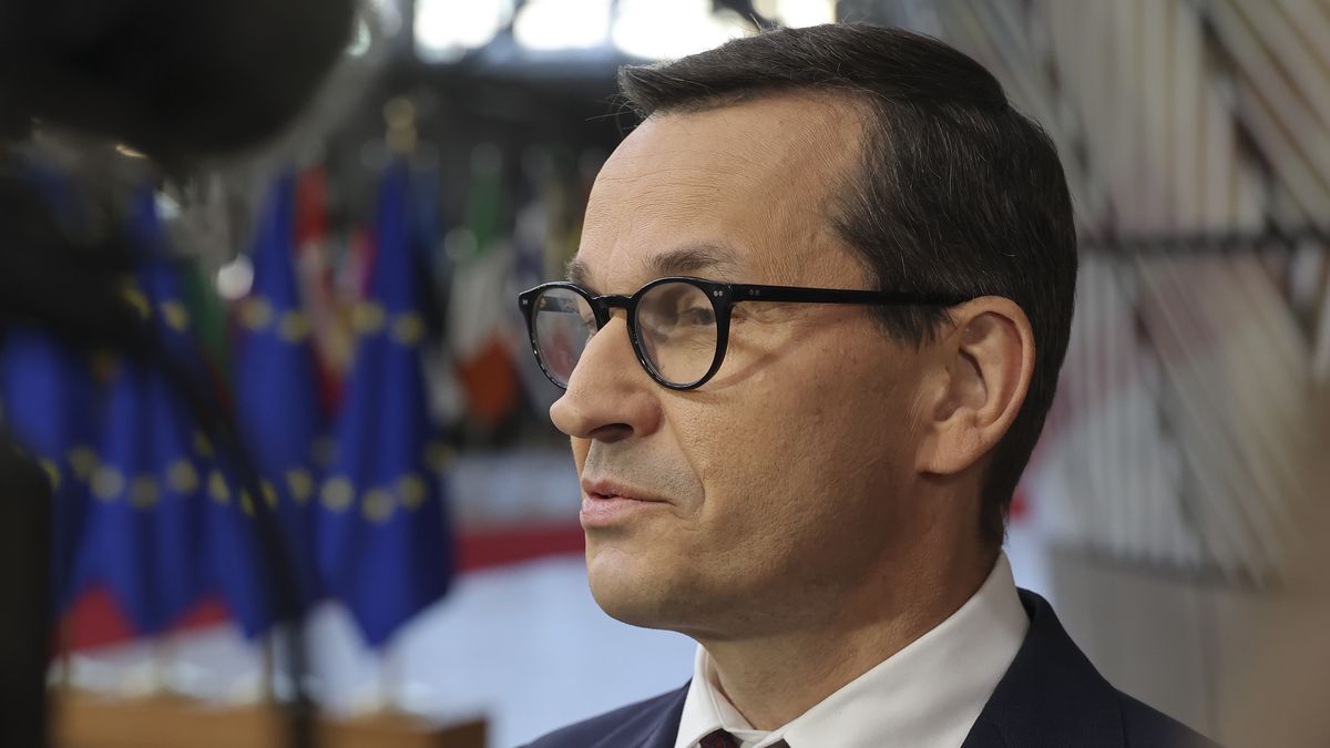 Mateusz Morawiecki Prime Minister of Poland arrives at the EU summit, walking next to the European flags, flag of Europe and talks to the media while is answering questions from journalists and the press. Meeting of the EU leaders, the European Council in Brussels, Belgium on October 20, 2022 (Photo by Nicolas Economou/NurPhoto via Getty Images)