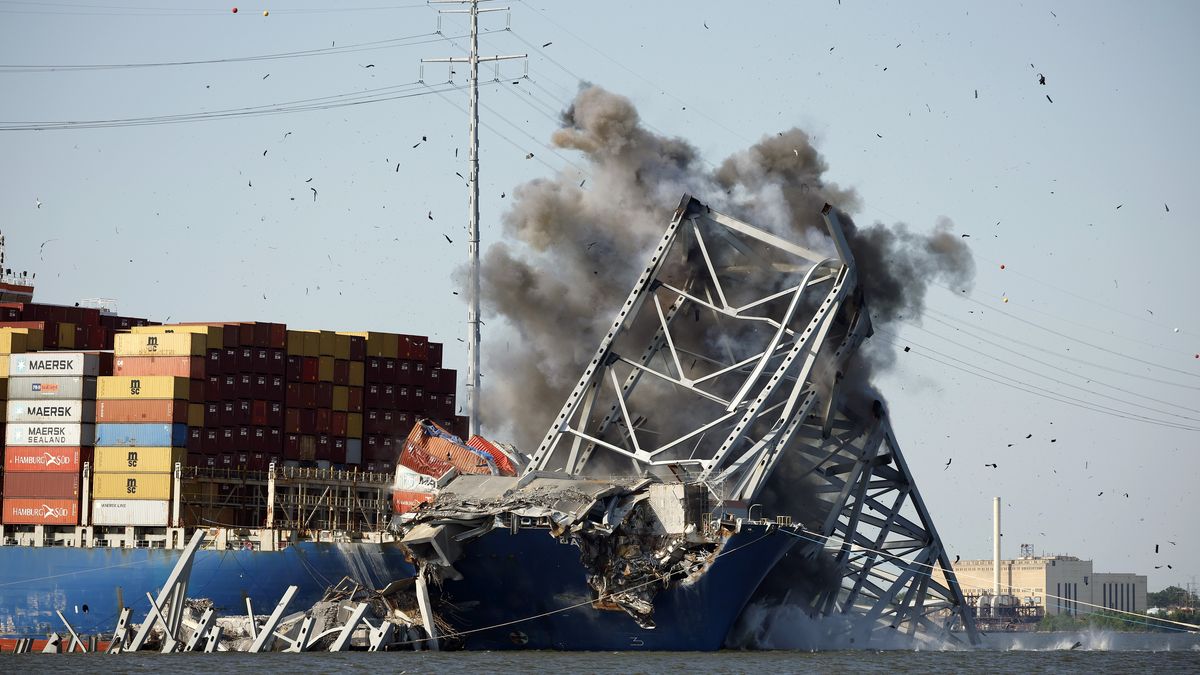 Crews Continue To Work To Reopen Shipping Lane At The Site Of The Francis Scott Key Bridge Collapse In Baltimore
BALTIMORE, MARYLAND - MAY 13: The Army Corp. of Engineers sets off a controlled demolition to remove wreckage from the Francis Scott Key Bridge off of the cargo ship Dali in the Patapsco River on May 13, 2024 in Baltimore, Maryland. An estimated 500-foot section of the bridge weighing 8-12 million pounds was removed by controlled demolition in the final stage of wreckage removal for the ship to be moved into port. On March 26th the Dali crashed into the Key Bridge causing it to collapse killing six construction workers. (Photo by Kevin Dietsch/Getty Images)
Kevin Dietsch