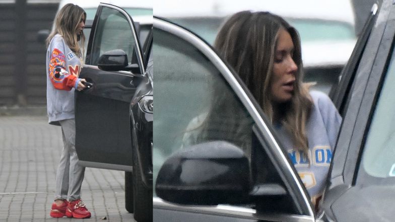 Zaspana Małgorzata Rozenek wędruje do samochodu