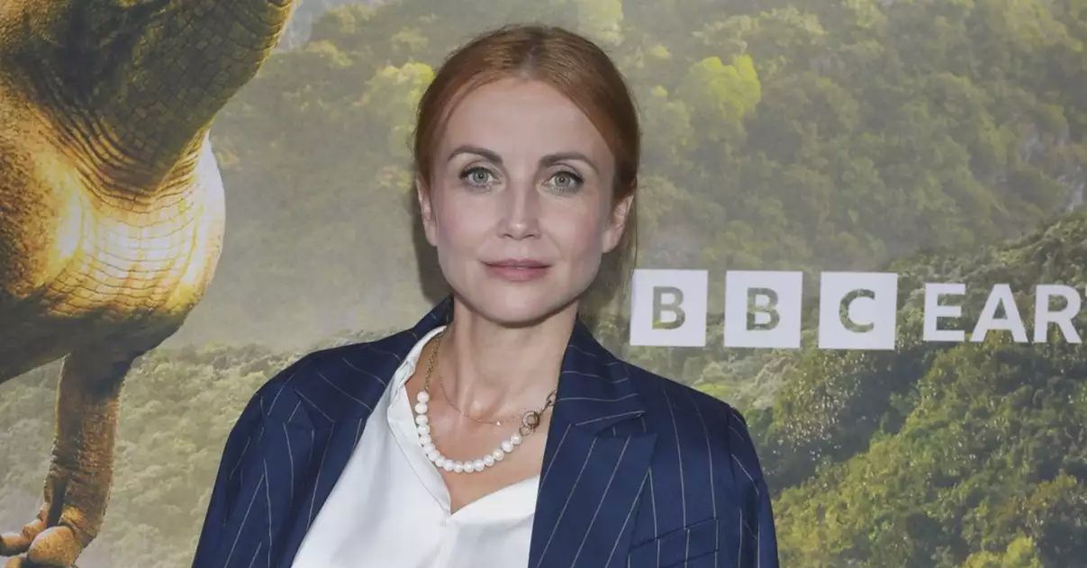 Katarzyna Zielińska w wyszczuplającym garniturze i z przepiękną koszulą. Klasa!