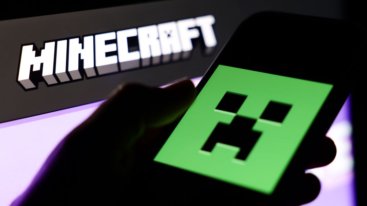 Minecraft website displayed on a laptop screen and Minecraft logo displayed on a phone screen are seen in this illustration photo taken in Krakow, Poland on March 31, 2025. (Photo by Jakub Porzycki/NurPhoto via Getty Images)