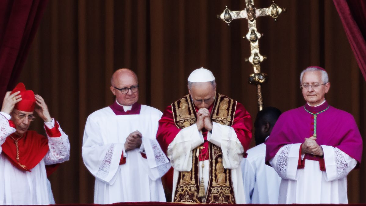 VATICAN CITY, VATICAN - MAY 08: The newly elected Pontiff, Pope Leo XIV is seen for the first time from the Vatican balcony on May 8, 2025 in Vatican City, Vatican. White smoke was seen over the Vatican early this evening as the Conclave of Cardinals took just two days to elect Cardinal Robert Francis Prevost, who will be known as Pope Leo (Leone) XIV, as the 267th Supreme Pontiff after the death of Pope Francis on Easter Monday. (Photo by Dan Kitwood/Getty Images)