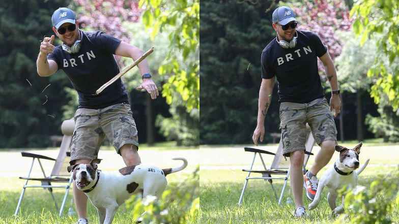 Filip Chajzer relaksuje się w parku