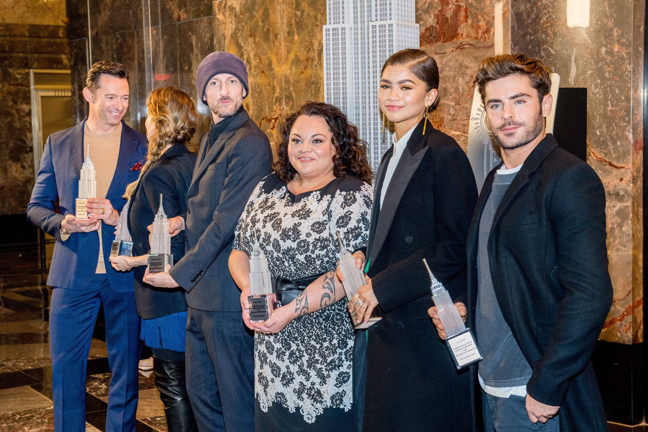 Hugh Jackman, Rebecca Ferguson, Michael Gracey, Keala Settle, Zendaya i Zac Efron