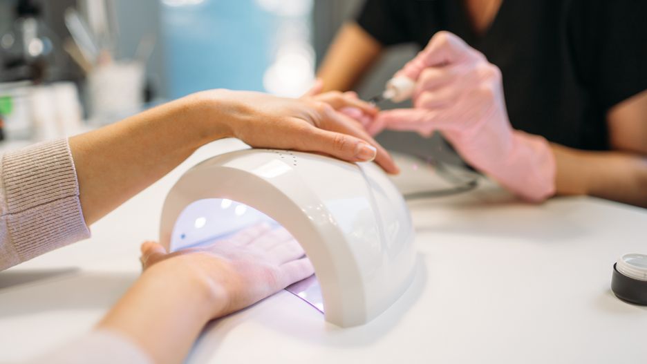 Female client dries gel varnish in the nail dryer
Female client dries gel varnish in the nail dryer, beautician in pink gloves on background, beauty salon. Manicurist doing hand care cosmetic procedure
manicure, hand, beauty, care, nail, female, finger, fingernail, salon, beautician, treatment, beautiful, people, cosmetic, woman, relaxation, polish, human, lifestyle, spa, luxury, elegance, manicurist, making, wellness, health, person, procedure, clean, closeup, women, applying, pampering, girl, skin, enamel, body, fashion, brush, service, french, file, paint, two, acrylic, femininity, polishing, client, studio, manicure, hand, beauty, care, nail, female, finger, fingernail, salon, beautician, treatment, beautiful, people, cosmetic, woman, relaxation, polish, human, lifestyle, spa, luxury, elegance, manicurist, making, wellness, health, person, procedure, clean, closeup, women, applying, pampering, girl, skin, enamel, body, fashion, brush, service, french, file, paint, two, acrylic, femininity, polishing, client, studio
