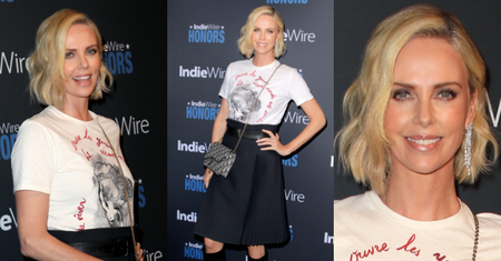 Charlize Theron chwali się hollywoodzkim uśmiechem i torebkę Diora za 14 tysięcy