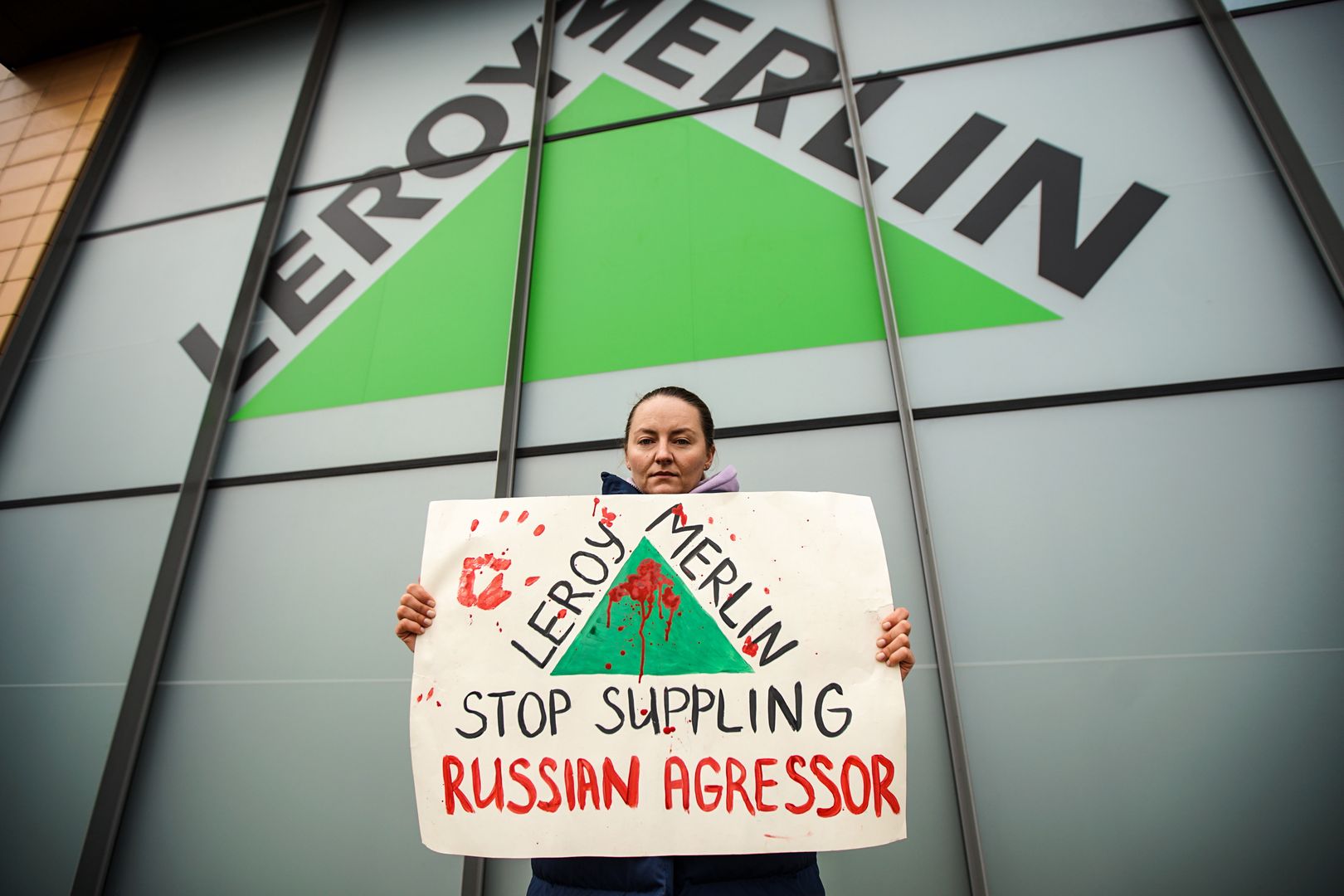 Dozen people gathered outside the French Leroy Merlin store in Gdansk, Poland on 19 March 2022  to protest against the company still operating in Russia after the Russian invasion of Ukraine.  (Photo by Michal Fludra/NurPhoto via Getty Images)