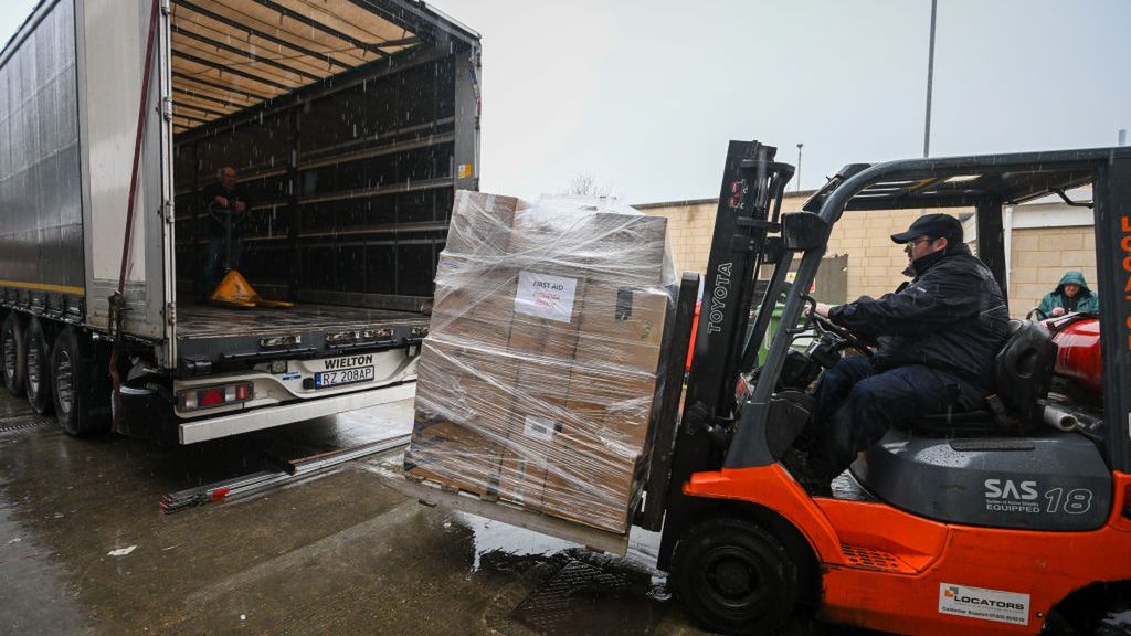 Donations For Ukraine Are Transported From Dorset
BOURNEMOUTH, ENGLAND - MARCH 16: Pallets with donated aid are loaded onto a HGV from the sorting depot on March 16, 2022 in Bournemouth, England. The 'Help from Bournemouth to Ukraine' hub, at Castlepoint is centralising donations across the south of Dorset. Karol Swiacki, a member of BCP's Polish community, launched this campaign which because of his connections with various cities, towns and charities on the Poland/Ukraine border he is receiving direct requests for urgent aid. (Photo by Finnbarr Webster/Getty Images)
Finnbarr Webster
