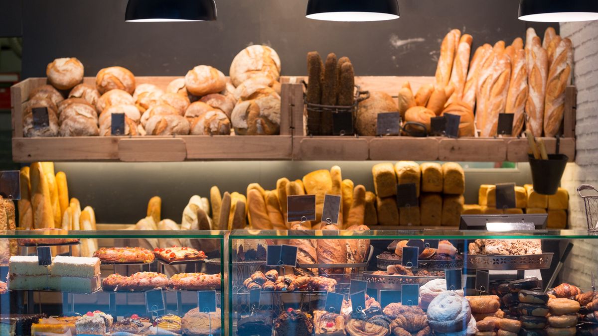 Modern bakery with different kinds of bread, cakes and buns  Iakov Filimonovmodern, bakery, different, assortment, kinds, bread, fancy, cakes, bun, croissant, loaf, showcase, counter, retail, small, medium, business, trade, store, shop, storefront, glass, sweet, fresh, baked, french, baguette cereals, healthy, eating, price, sell, stock, bagel, grain, pastry, confectionary, cream, filled, sponge, doughnut, granary, shelves, stand