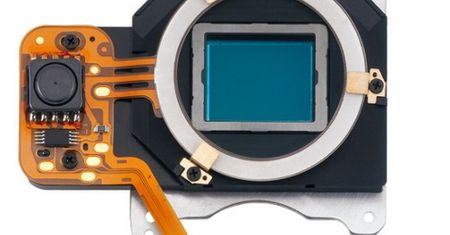 Jak działa system redukcji kurzu w Olympusach?