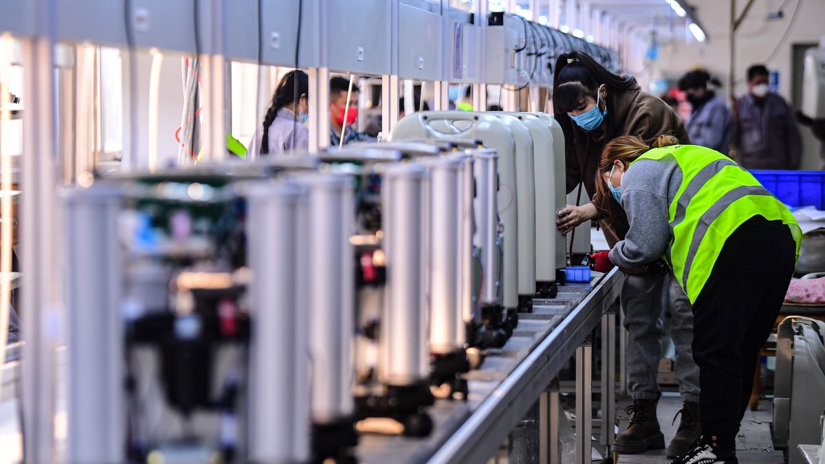 SHENYANG, CHINA - JANUARY 05: Workers manufacture oxygen concentrators at a medical equipment company on January 5, 2023 in Shenyang, Liaoning Province of China. (Photo by VCG/VCG via Getty Images)