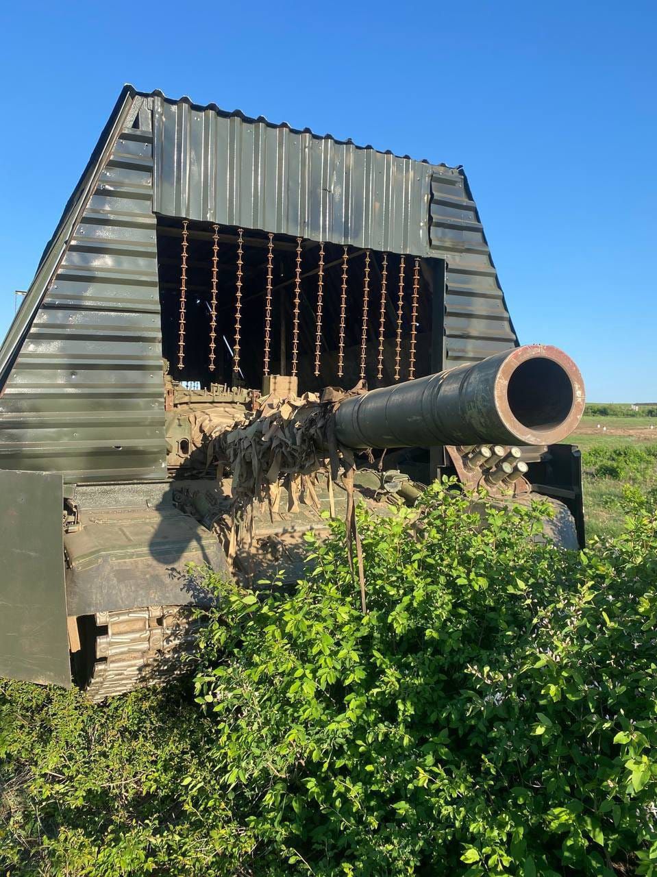 Russian "armored barn" with additional curtains.