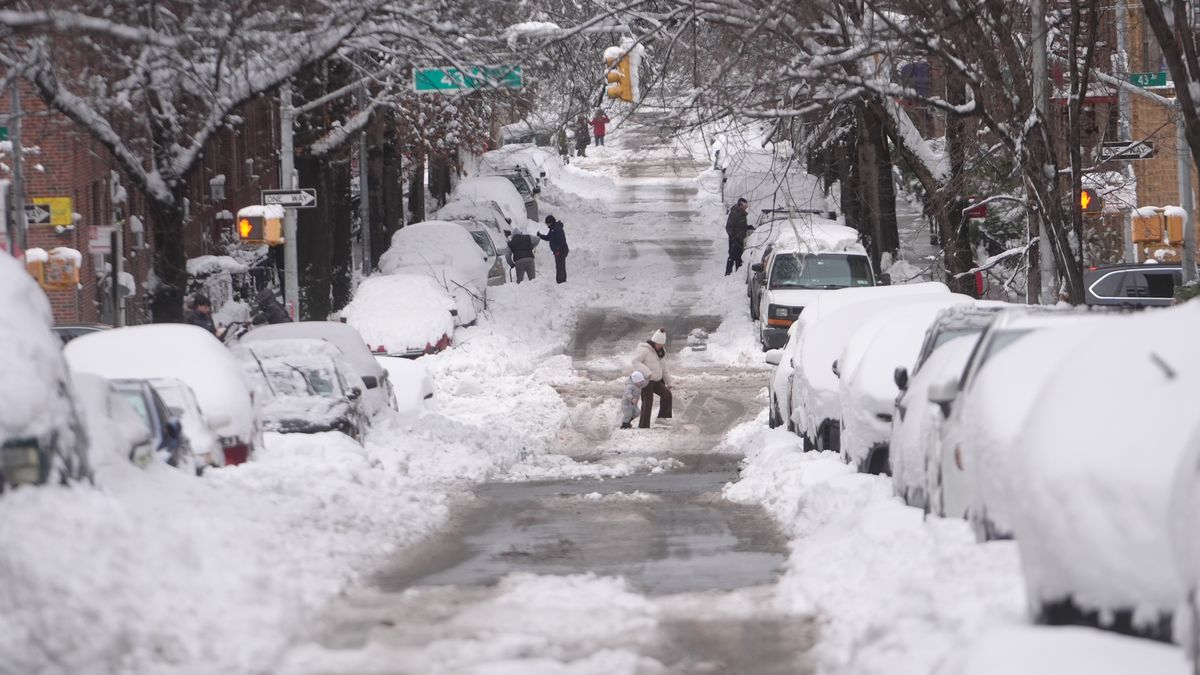 NEW YORK, UNITED STATES - FEBRUARY 23: A view of a snow-covered street after a powerful, multi-day blizzard dumped about 19 inches of snow in Long Island City, New York, United States on February 23, 2026. (Photo by Selcuk Acar/Anadolu via Getty Images)
