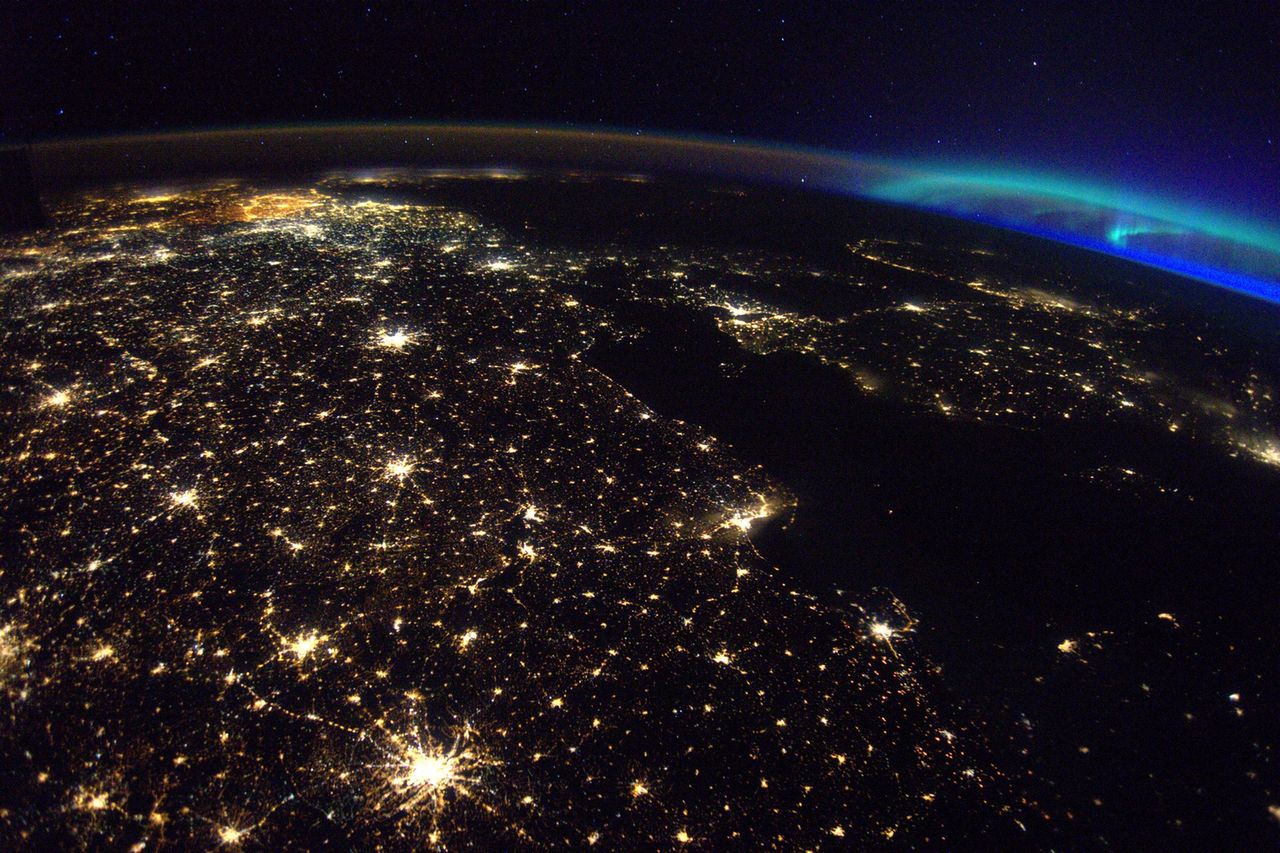 The aurora borealis visible north of Poland over Scandinavia.