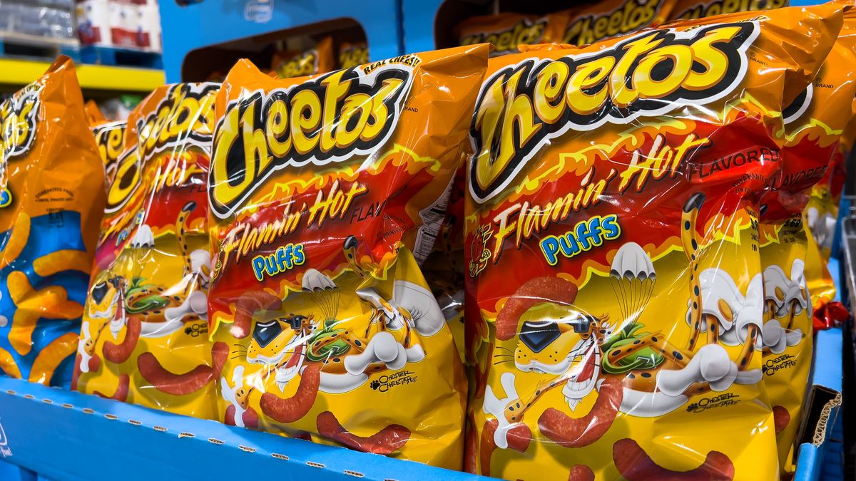 flamin' hot, cheetos, cheese, corn puff, supermarket, cheesy treats, flamin, hot, chips, corn, market, shelf, aisle, retail, retailer, indoors, no people, nobody, bags, brand, for sale, business, close up, display, in a row, food, sale, frito lay, frito lays, groceries, snack, junk food, grocery store, store, convenience store, shelves, hypermarket, flaming, shop, usa, american, unhealthy, frito lay's, crispy, crunchy, fried, deep fried, package, lemon