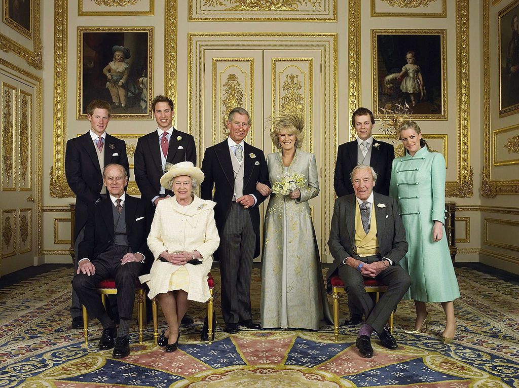 The queen in white at the wedding of Camilla and Charles.