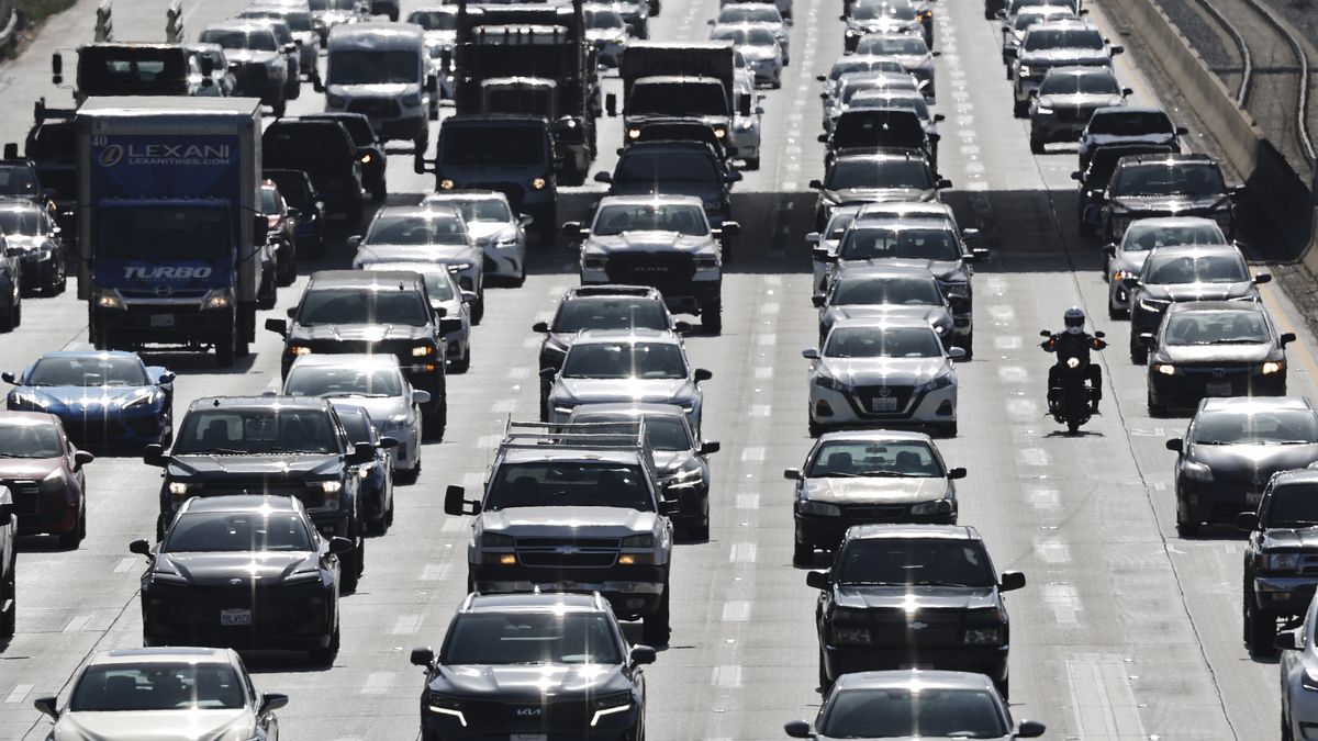 PASADENA, CALIFORNIA - MAY 23: Vehicles drive on Interstate 210 ahead of the Memorial Day weekend on May 23, 2025 in Pasadena, California. The American Automobile Association (AAA) projects over 45 million Americans will travel for Memorial Day weekend, which would be a record breaking number and a 4% increase from last year. (Photo by Mario Tama/Getty Images)