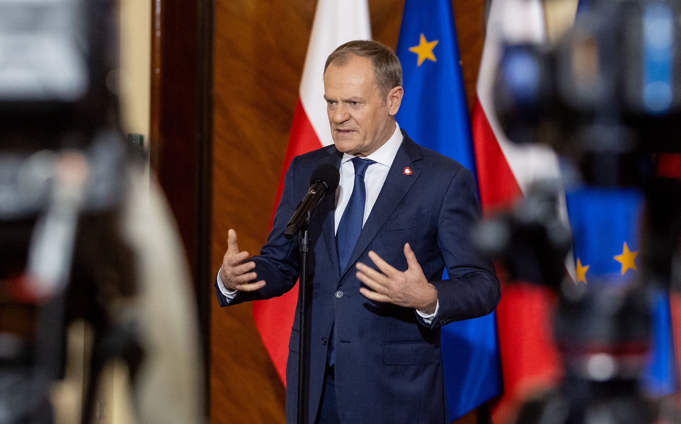 Polish Prime Minister Donald Tusk is speaking during a press conference after a government meeting in Warsaw, Poland, on January 3, 2024. (Photo by Foto Olimpik/NurPhoto via Getty Images)
