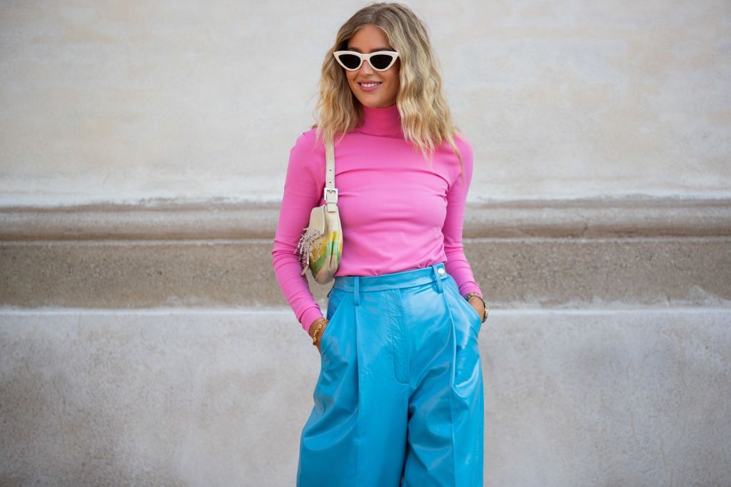 Street Style - Day 3 - Copenhagen Fashion Week Spring/Summer 2021COPENHAGEN, DENMARK - AUGUST 11: Emili Sindlev is seen wearing pink turtleneck, turquoise pants outside Remain Birger Christensen during Copenhagen Fashion Week Spring/Summer 2021 on August 11, 2020 in Copenhagen, Denmark. (Photo by Christian Vierig/Getty Images)Christian Vierig