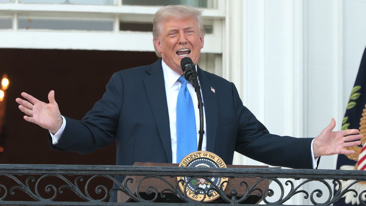 WASHINGTON, DC - JUNE 04: U.S. President Donald Trump speaks to guests from the Truman Balcony of the White House during an event on the South Lawn on June 04, 2025 in Washington, DC. Trump held the “Summer Soirée” for guests, including government staffers, to visit the grounds and enjoy the recent onset of summer heat. (Photo by Anna Moneymaker/Getty Images)