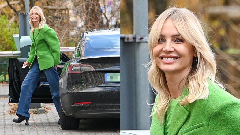 Agnieszka Woźniak-Starak odjeżdża spod pracy w elektrycznym samochodzie