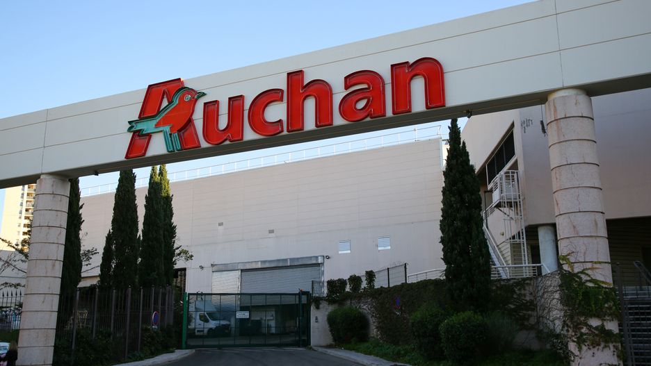MARSEILLE, FRANCE - 2024/11/13: An Auchan logo seen on the hypermarket in Marseille. The distribution group is experiencing great difficulties and has announced that it wants to close around ten stores in France and cut 2,389 jobs.
In France. (Photo by Denis Thaust/SOPA Images/LightRocket via Getty Images)
