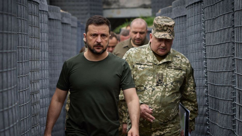 Temporary
This handout photograph taken and released by the Ukrainian Presidential Press Service on July 30, 2024, shows Ukraine's President Volodymyr Zelensky (L) inspecting the construction of fortifications at an undisclosed location in Volyn region, amid the Russian invasion of Ukraine. (Photo by Handout / UKRAINIAN PRESIDENTIAL PRESS SERVICE / AFP) / RESTRICTED TO EDITORIAL USE - MANDATORY CREDIT "AFP PHOTO / UKRAINIAN PRESIDENTIAL PRESS SERVICE" - NO MARKETING NO ADVERTISING CAMPAIGNS - DISTRIBUTED AS A SERVICE TO CLIENTS
HANDOUT