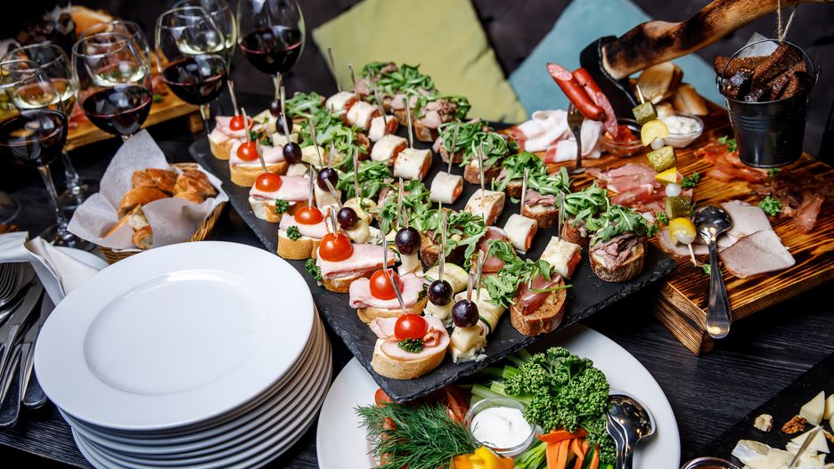 Beautifully decorated snacks on the banquet table before the holidayBeautifully decorated snacks on the banquet table before the holiday. Event CateringPIOTR PIATROUSKIevent, restaurant, banquet, wedding, food, cater, lunch, luxury, service, waitress, corporate, reception, waiter, catering, buffet, hotel, party, snack, table, dish, snacks, platter, hospitality, beverage, dinner, server, work, seafood, room, bar, meat, decorated, appetizer, serve, festive, business, eating, drink, plate, finger, celebration, dining, people, cuisine, toast, staff, appetite, tasty, decoration, fresh