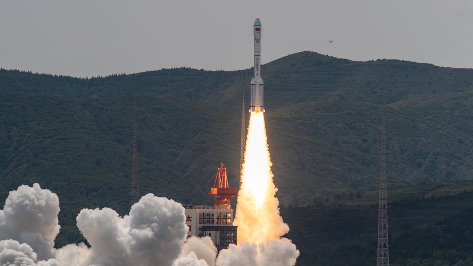 TAIYUAN, CHINA - AUGUST 06: A Long March 6A rocket carrying the satellite group blasts off from the Taiyuan Satellite Launch Center on August 6, 2024 in Taiyuan, Shanxi Province of China. The satellite group, consisting of 18 satellites, was launched at 2:42 p.m. aboard a Long March 6A carrier rocket and entered its preset orbit successfully. (Photo by VCG/VCG via Getty Images)