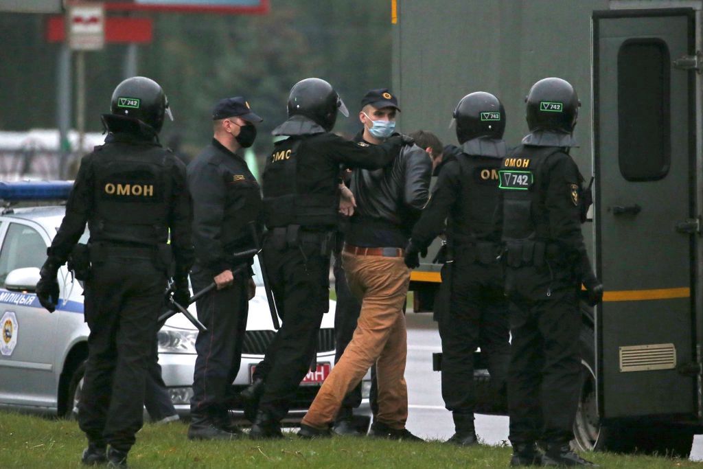 Events in Minsk, BelarusMINSK, BELARUS - OCTOBER 11, 2020: Riot police officers detain a participant in the March of Pride opposition event. Mass protests against the presidential election results have been occurring in Minsk and other Belarusian cities since August 9. According to the Belarusian Central Election Commission, incumbent president Alexander Lukashenko won by landslide with 80.1% of votes polled. Runner-up candidate Svetlana Tikhanovskaya who polled 10.12% refused to accept the election results and became one of the founders of the Belarusian opposition's Coordination Council. Subsequent rallies rapidly escalated into violent clashes with the police. Opposition activists call for further protest events, whereas the authorities demand to end them. Natalia Fedosenko/TASS (Photo by Natalia Fedosenko\TASS via Getty Images)Natalia Fedosenkoprotests, rally, clashes, opposition, supporters, demonstration, law enforcement, protester, protesters