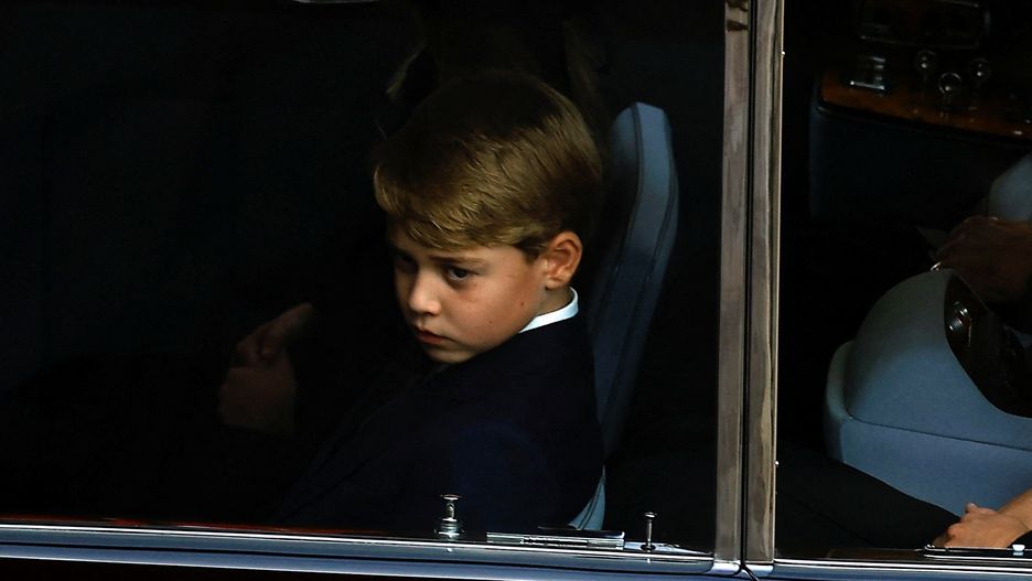 The Committal Service For Her Majesty Queen Elizabeth IIWINDSOR, ENGLAND - SEPTEMBER 19: Prince George and Catherine, Princess of Wales sit in a car as it drives on the day of the state funeral and burial of  Queen Elizabeth, at Windsor Castle, on September 19, 2022 in Windsor, England. The committal service at St George's Chapel, Windsor Castle, took place following the state funeral at Westminster Abbey. A private burial in The King George VI Memorial Chapel followed. Queen Elizabeth II died at Balmoral Castle in Scotland on September 8, 2022, and is succeeded by her eldest son, King Charles III. (Photo by Peter Nicholls - WPA Pool/Getty Images)WPA Pool