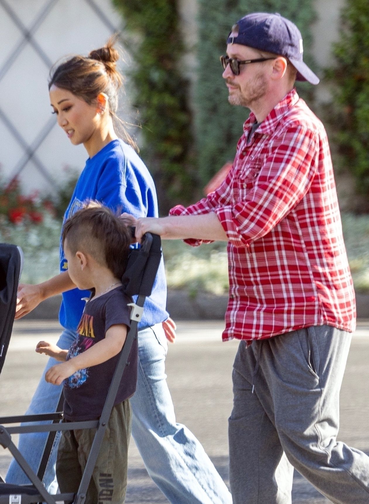 Macaulay Culkin on a family walk