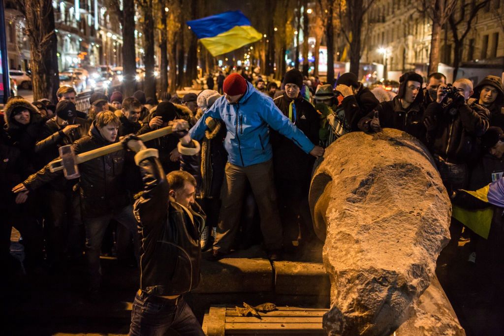Thousands Protest In Kiev As They Call On Government Leaders To ResignKIEV, UKRAINE - DECEMBER 8: Anti-government protesters use a sledge hammer to destroy a statue of Russian communist revolutionary leader Vladimir Lenin on December 8, 2013 in Kiev, Ukraine. Thousands of people have been protesting against the government since a decision by Ukrainian president Viktor Yanukovych to suspend a trade and partnership agreement with the European Union in favor of incentives from Russia. (Photo by Brendan Hoffman/Getty Images)Brendan Hoffmanbestof, bestof, topics, topics, topix, topix, toppics, toppics, toppix, toppix