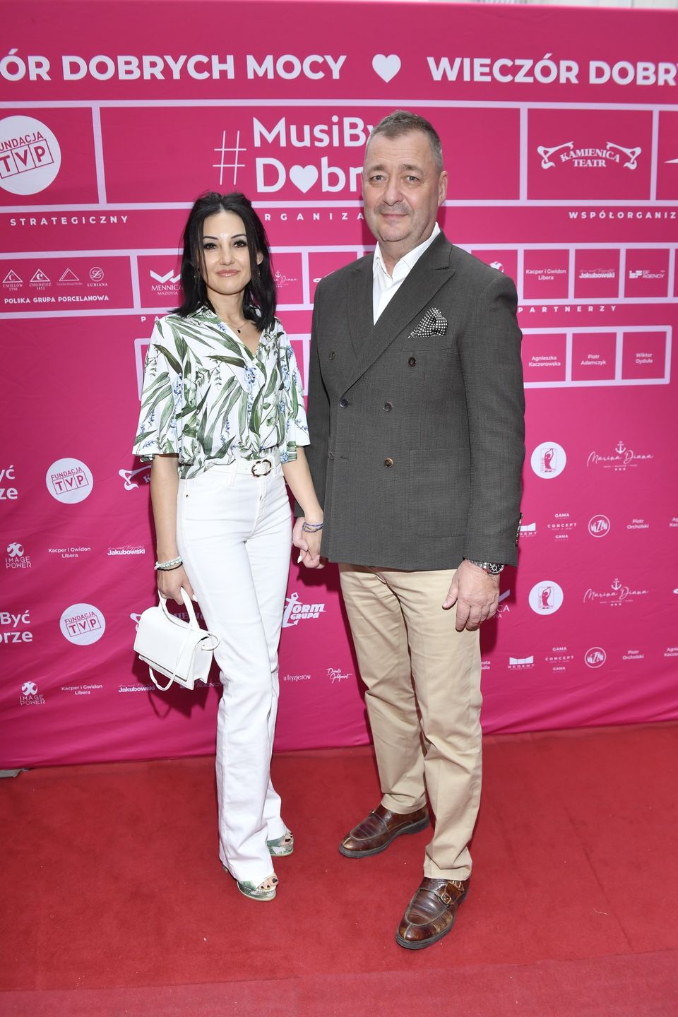 Jacek Rozenek z żoną