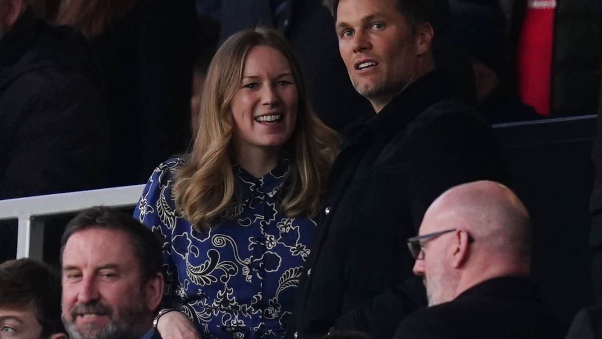 Former American football quarterback Tom Brady (right) in the stands before the Premier League match at Old Trafford, Manchester. Picture date: Saturday March 12, 2022. (Photo by Martin Rickett/PA Images via Getty Images)