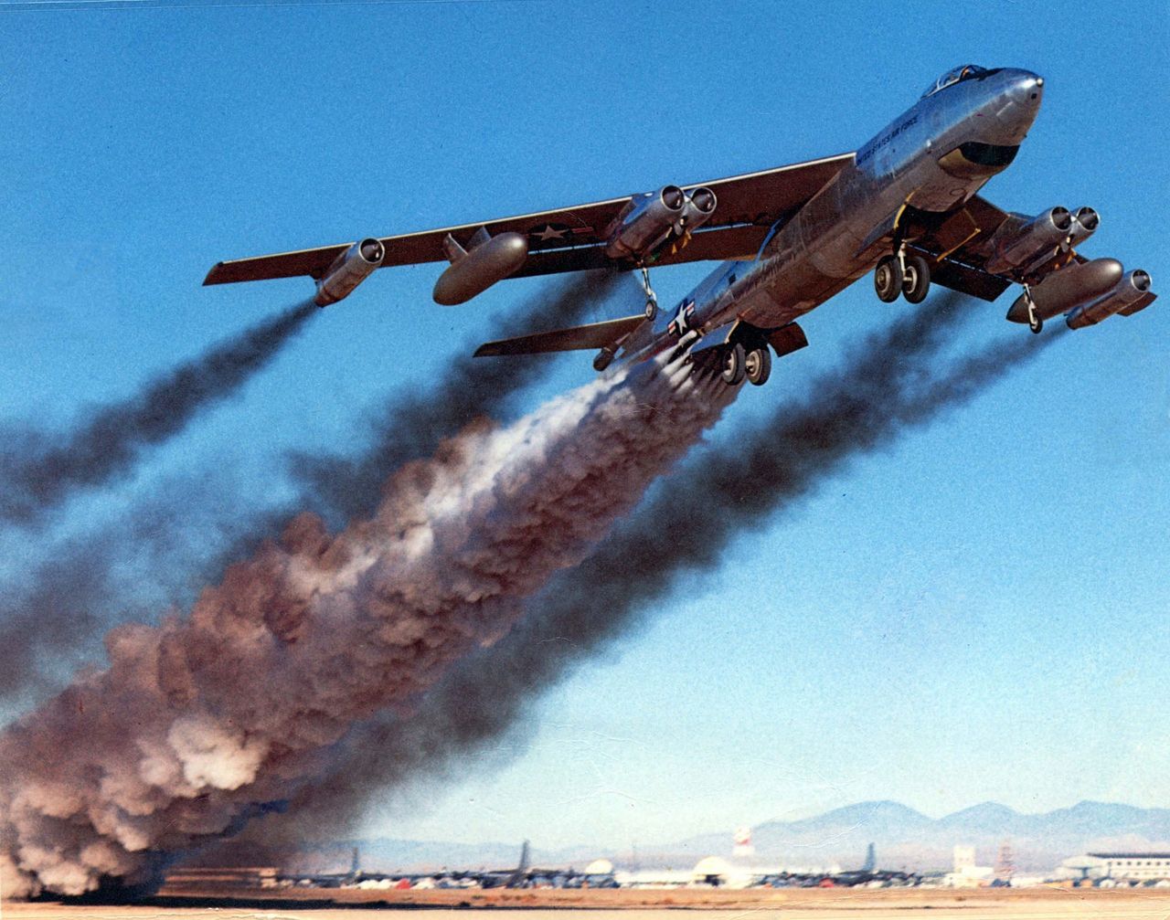 The B-47 bomber takes off using rocket-assisted takeoff units.