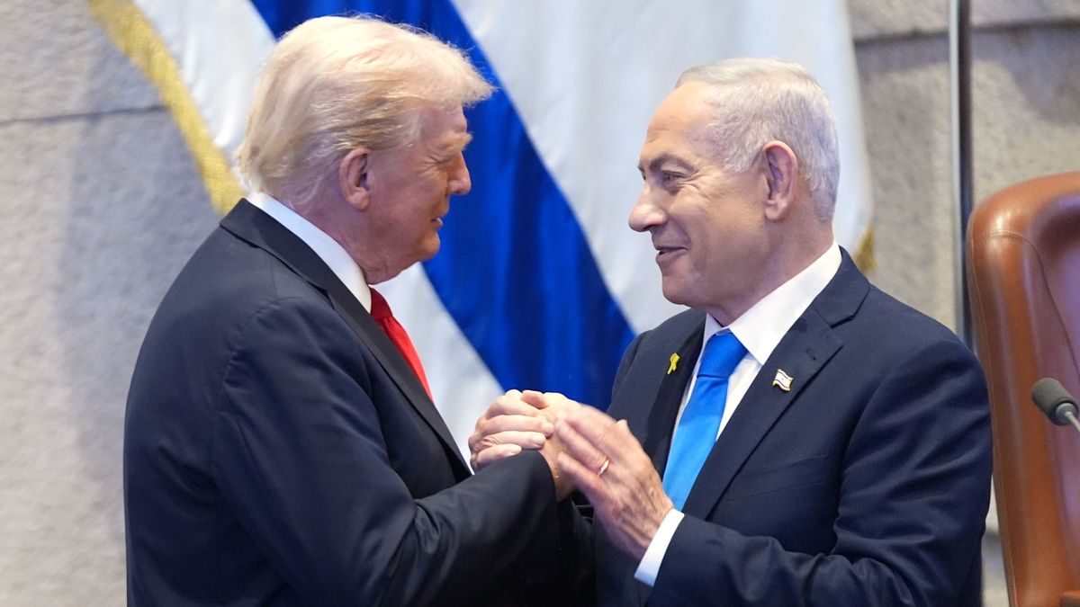 JERUSALEM - OCTOBER 13: U.S. President Donald Trump talks with Israel's Prime Minister Benjamin Netanyahu in the Knesset, Israel's parliament, on October 13, 2025 in Jerusalem. President Trump is visiting the country hours after Hamas released the remaining Israeli hostages captured on Oct. 7, 2023, part of a US-brokered ceasefire deal to end the war in Gaza. (Photo by Evan Vucci - Pool/Getty Images)