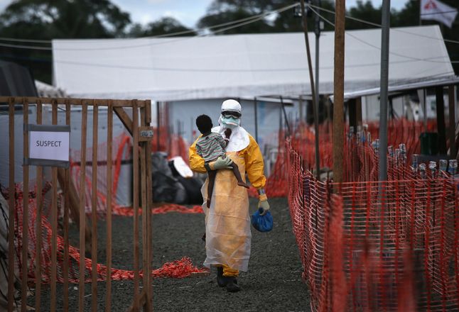 @ John Moore / „Kryzys związany z wirusem Ebola w stolicy Liberii” / Nagroda L’Iris d’Or, tytuł Fotografa Roku