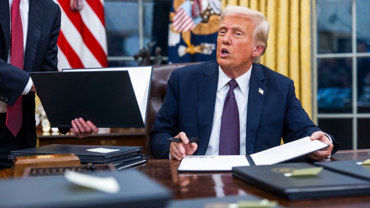 US President Donald Trump speaks while signing executive orders in the Oval Office of the White House in Washington, DC, US, on Monday, Jan. 20, 2025. President Donald Trump launched his second term with a strident inaugural address that vowed to prioritize Americas interests with a "golden age" for the country, while taking on "a radical and corrupt establishment." Photographer: Jim Lo Scalzo/EPA/Bloomberg via Getty Images