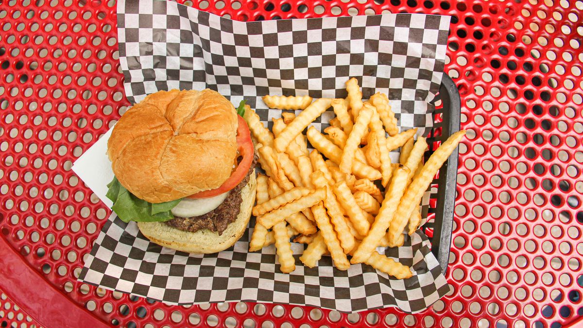 Hamburger and French Fries on Tray Outdoors
Image by Marie LaFauci