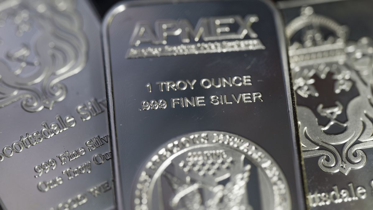 Silver bars appear in a photo illustration as silver prices move amid shifting industrial demand and global market volatility in Brussels, Belgium, on December 24, 2025. (Photo by Jonathan Raa/NurPhoto via Getty Images)