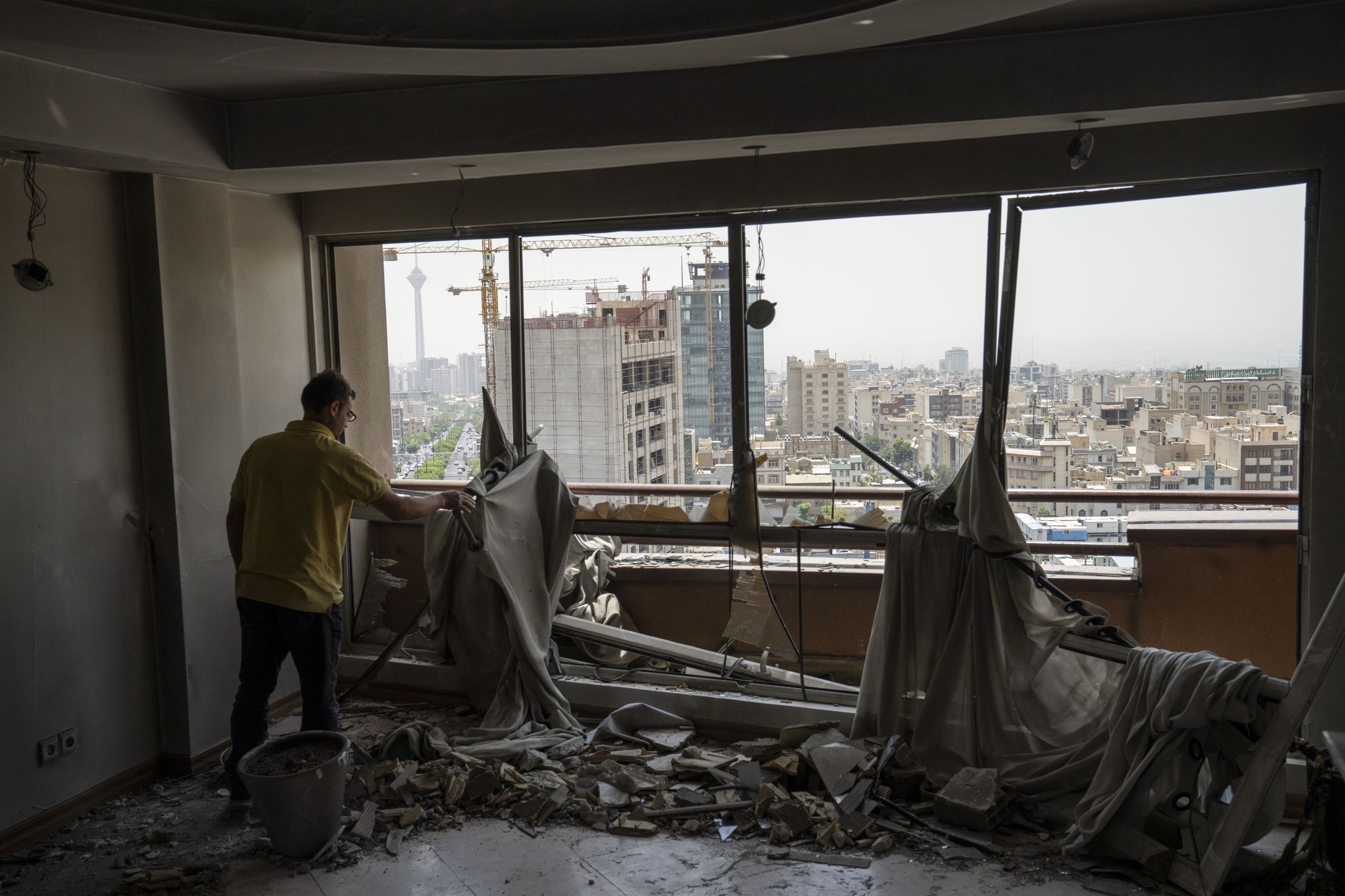 TEHRAN, IRAN - JUNE 26: Damage is seen in a residential building in the Saadat Abad neighborhood of Tehran that was struck by an Israeli attack on June 13, resulting in the death of Dr. Tehranchi, the president of Azad University, and 16 civilians on June 26, 2025 in Tehran, Iran. A cease-fire between Israel and Iran has brought an end to 12 days of daily aerial attacks that started with Israel's strikes on Iranian military and nuclear sites on June 13. (Photo by Majid Saeedi/Getty Images)