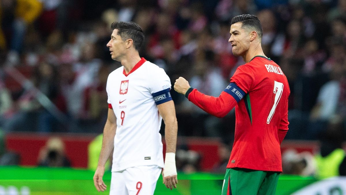 Cristiano Ronaldo reacts after scoring a goal while Robert Lewandowski looks on during the UEFA 2024 UEFA Nations League Group A1 match between Poland and Portugal at the PGE Narodowe in Warsaw, Poland, 12 October 2024. (Photo by Andrzej Iwanczuk/NurPhoto via Getty Images) (Photo by Andrzej Iwanczuk/NurPhoto via Getty Images)