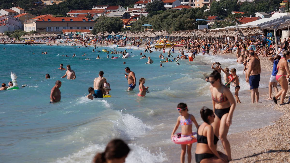 People are seen at city beach in Baska at Island Krk, Croatia on August15, 2023. This year's tourist season is at the level of the pre-pandemic, record-breaking 2019. Croatia is now recording 12.5 million arrivals and 63 million overnight stays. (Photo: Nel Pavletic/PIXSELL/DeFodi Images News/Getty Images)